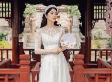 Áo dài ren trắng cho nàng dâu mùa xuân