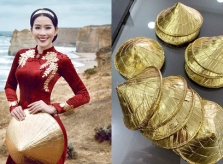 Nam Em cầm nón lá dát vàng
